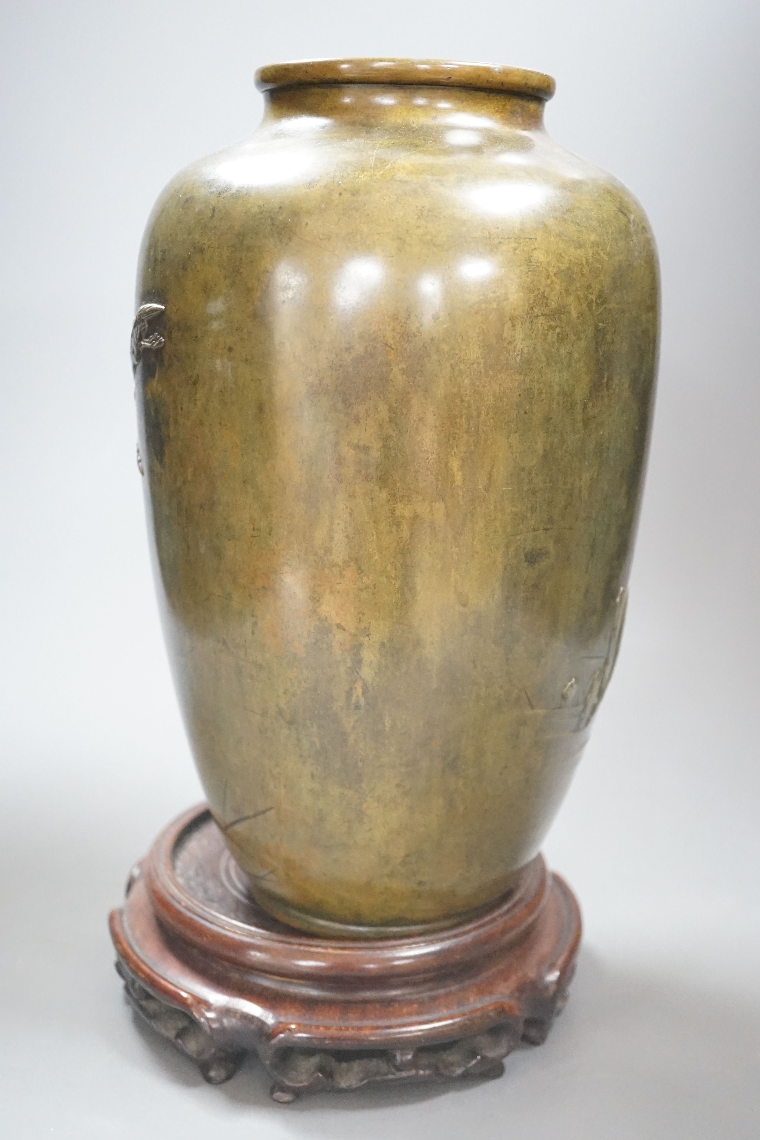 A Japanese Meiji period bronze vase, wood stand - 35cm tall